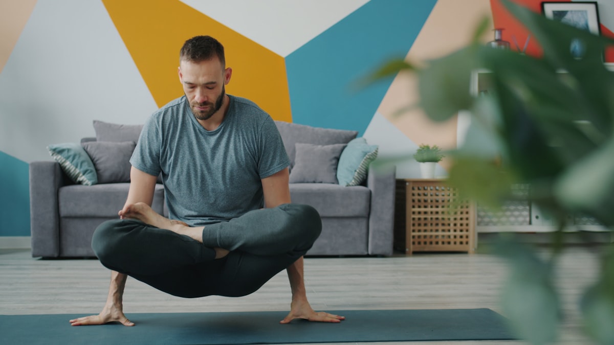 Man performing flexibility training exercise